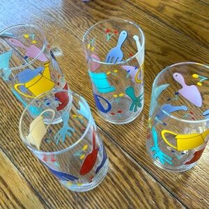 Vintage garden theme set of 4 tumblers. Clear with bright color garden items.